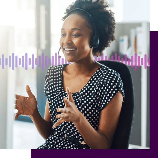 Photo of a smiling contact center agent talking to a customer through her phone headset. In the background, a series of small gradient purple lines run across the frame.