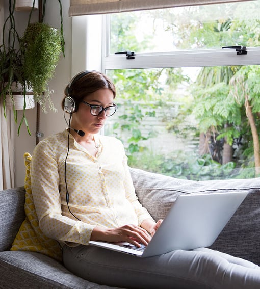 Girl using laptop to work from home